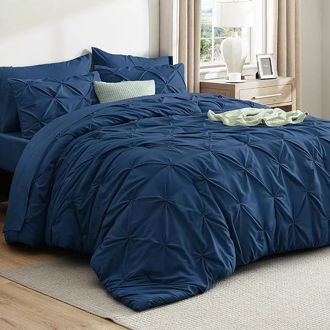 Recyclable Bedsure California King Comforter Set Navy – Bed in a Bag Cal King Bedding Set 7 Pieces GentleSoft™ Pintuck Bed Set Gift for Family Pinch Pleat Navy Comforter with Sheets Pillowcases amp Shams Classic