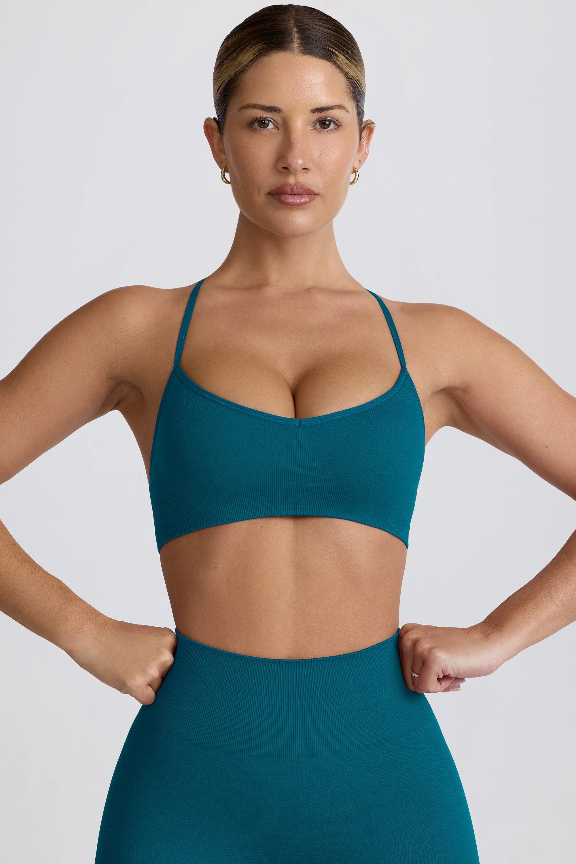 Premium Super Sculpt Seamless Cross-Back Sports Bra in Teal Environmentally Friendly
